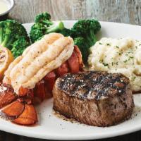 Filet & Lobster Tail · 7 oz USDA filet mignon paired with seasoned and steamed lobster tail (560 cal)