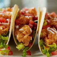 Bang Bang Shrimp Tacos · Three warm tortillas, our signature Bang Bang Shrimp, greens, tomatoes and sour cream (1570 ...