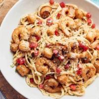 Baja Scallops And Shrimp Scampi  · Tender Bay Scallops, hand-harvested off the Baja coast, tossed with Shrimp in a garlic scamp...