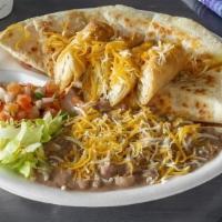 Fiesta Plate · Most Popular. Quesadilla, rolled beef taquitos side of beans, sour cream, pico de gallo, and...