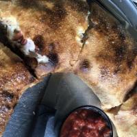 Ale Stromboli · Pepperoni, sausage, blended mozzarella cheese filled pizza roll.