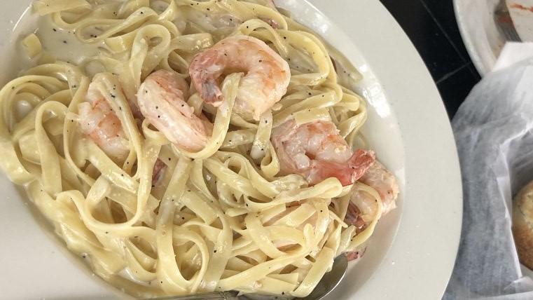 Ale Alfredo · This recipe is from our grandma. It's simple creamy alfredo sauce with a touch of garlic, finished up with Romano cheese. Served with pasta. Add chicken or shrimp for additional charge.