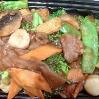Beef & Scallop With Vegetables · Beef and scallops with baby carrots, broccoli, water chestnuts in brown sauce.
