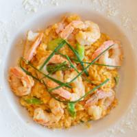 Risotto & Shrimps · Sun-dried tomatoes, shrimps and asparagus risotto. (served with a creamy cheese sauce).