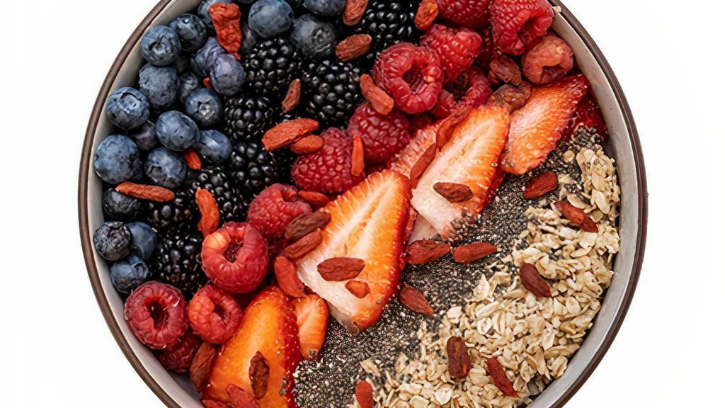 Berries Fruit Bowl · blackberry, blueberry, raspberry and strawberry, topped with goji berries, granola, chia seeds and honey