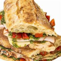 Turkey & Pesto · antibiotic free turkey, roasted red bell peppers and provolone cheese with basil pesto sauce...