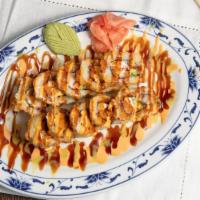 Dynamite Roll · Spicy tuna, jalapeno, whole roll deep fried, served with spicy mayo eel sauce.