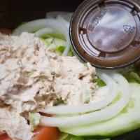 Tuna Salad Or Chicken Salad Plate · Homemade Tuna or Chicken Salad over a bed of Iceberg Lettuce, Onions, Tomatoes, Cucumbers an...