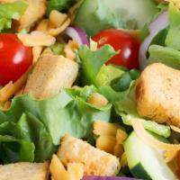 House Salad · Iceberg Lettuce, Tomatoes, Onions, Cucumbers and Croutons.