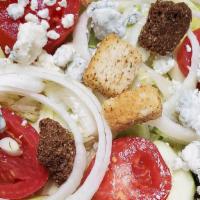 Gorgonzola Salad · Iceberg Lettuce, Tomatoes, Onions, Cucumbers,
Croutons and Gorgonzola Cheese served with Bal...