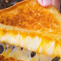 Grilled Cheese · American Cheese between two pieces of White Bread