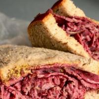 Hot Corned Beef · Corned Beef Served on Rye Bread with Spicy Mustard