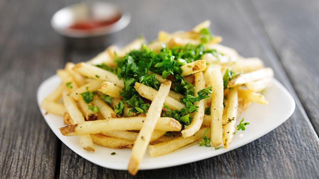 Truffle Fries · Deep-fried golden French fries tossed in a fragrant truffle oil topped with fresh parmesan.