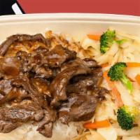 Beef Teriyaki · served with white rice and mix vegetables, topped with our signature Fuji Teriyaki sauce