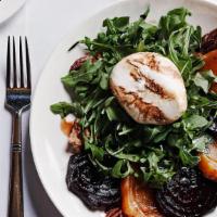 Burrata · Burrata cheese, candied walnuts, roasted red and gold beets, 15-year-old aged balsamic vineg...