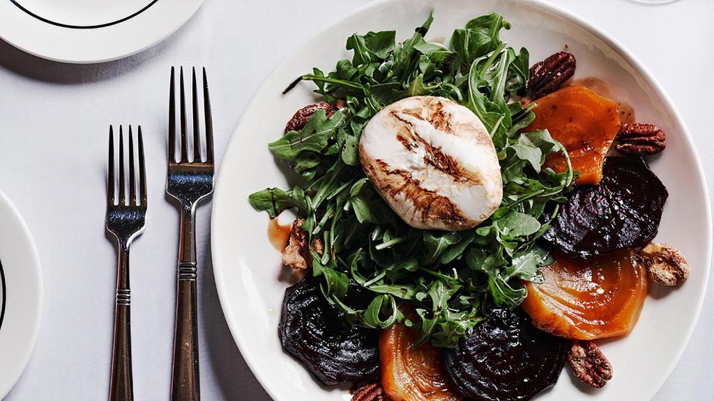 Burrata · Burrata cheese, candied walnuts, roasted red and gold beets, 15-year-old aged balsamic vinegar, arugula, EVOO.