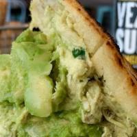 Arepa Reina Pepiada · Shredded white meat chicken tossed with tender avocado and mayonnaise.