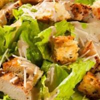 Caesar Salad With Chicken · Lettuce, bacon, croutons, Parmesan cheese, and grilled chicken.