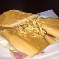 Miami Sandwich · Ham, turkey, bacon, lettuce and tomatoes with swiss cheese and mayo on a toasted cuban bread...