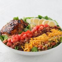 Bbq Salmon Salad · Barbequed salmon atop lettuce, tomatoes, charred corn salsa, smoked cheddar and bacon, with ...