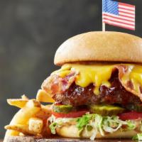 Bbq Bacon Cheeseburger · Crispy hickory-smoked bacon and American cheese, topped with tangy BBQ sauce. Served on a to...
