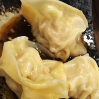 Wanton Dumpling · Pork & shrimp in a Szechuan chili oil.