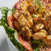 Chicken Salad · Grilled or fried chicken over lettuce, tomatoes, cheese and cucumbers. Your choice of dressi...