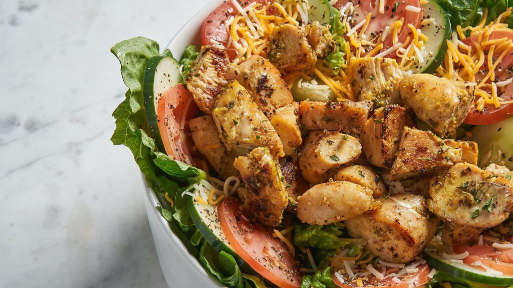Chicken Salad · Grilled or fried chicken over lettuce, tomatoes, cheese and cucumbers. Your choice of dressing.