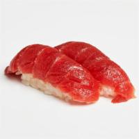 Tuna Nigiri · Two pieces of tuna over pressed sushi rice.