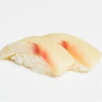 Yellowtail Nigiri · Two pieces of yellowtail over pressed sushi rice.