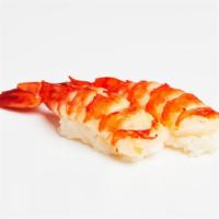 Shrimp Nigiri · Two pieces of shrimp over pressed sushi rice.