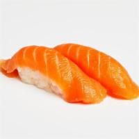 Salmon Nigiri · Two pieces of salmon over pressed sushi rice.