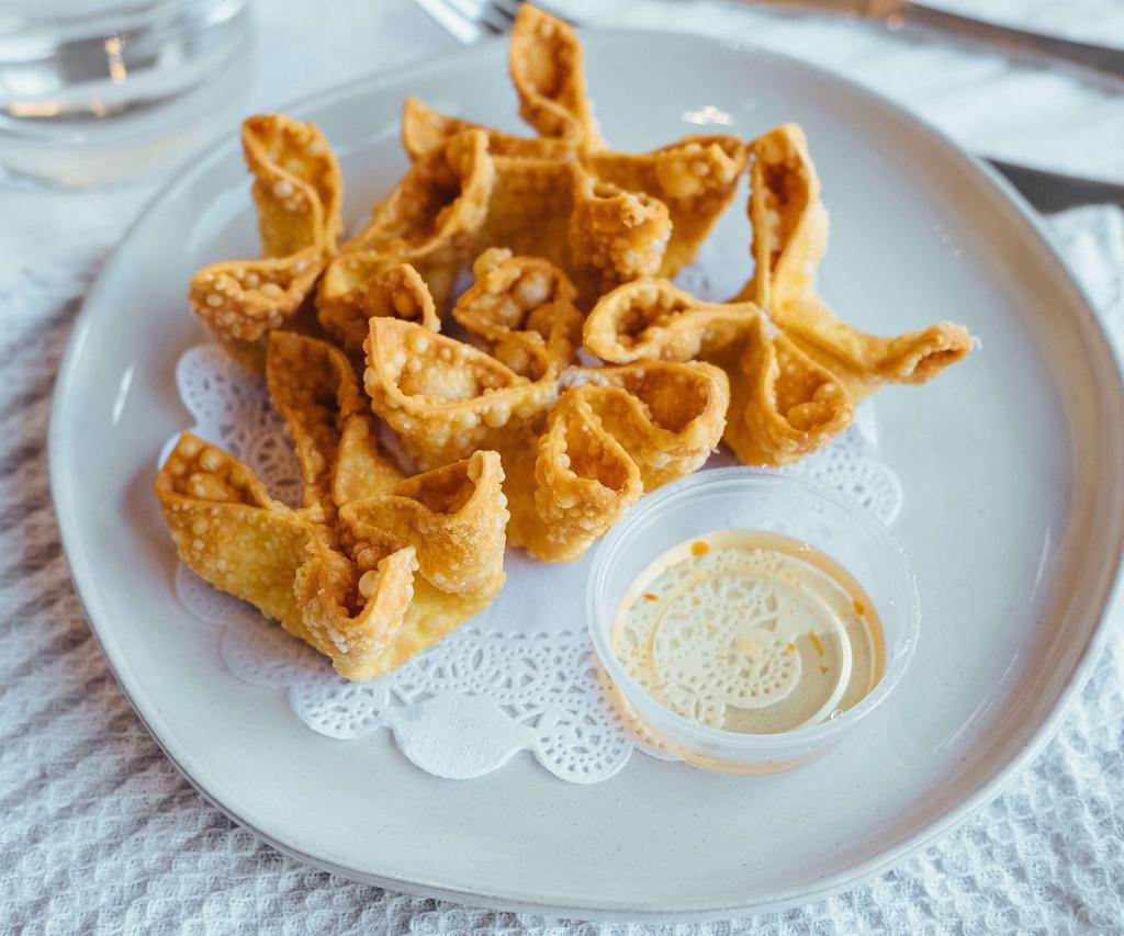 Crab Rangoon (5 Pcs) · Golden fried wonton filled with cream cheese, crab meat and scallion.