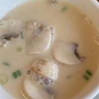 Coconut Chicken Soup · Mushroom, scallion and cilantro.