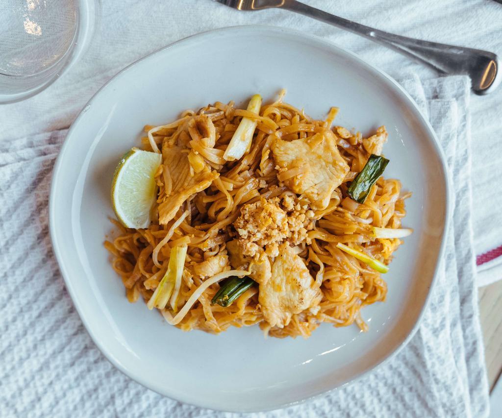 Pad Thai · Rice noodles, eggs, scallion, bean sprout, lime and crushed peanut.