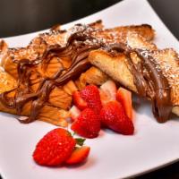 French Toast With Nutella · 3 big bread slices  with Nutella, strawberries and blueberries.
