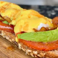 Papillon'S Eggs Benedict · Apple Bacon, avocado, tomatoes, Hollandaise sauce and sriracha on top of a  bread of choice,...