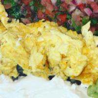 Breakfast Burrito · eggs, rice n' beans, corn, sour cream and pico de gallo.