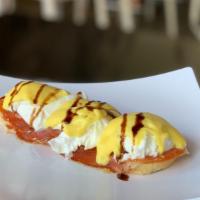 Spanish Eggs Benedict · Choice of white, whole wheat baguette or croissant as bed of Serrano ham and Spanish sausage...
