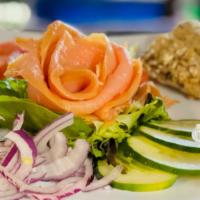 Salmon Plate · Smoked salmon, cream cheese, bermuda, onions, tomato, lettuce, cucumber, and capers, with to...