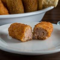 Croquetas · Filled and fried breadcrumb fritter.