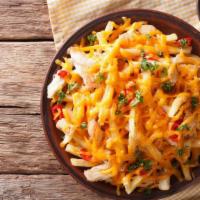 Chili Cheese Fries · Exquisite french fries mixed with melted cheese and chili, made to taste!