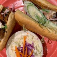 Saigon Sandwich · Roasted Chicken Thighs with
 Cucumbers, Carrot, Red Onions, Cilantro and a Sweet & Spicy May...