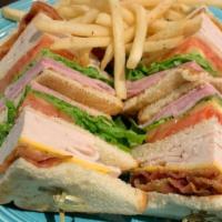 Jacaranda Club · Triple-decker of ham, turkey, bacon,  cheese, lettuce & tomato on toast
