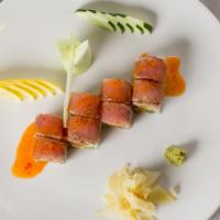 Crazy Tuna · Spicy tuna, avocado, pepper tuna, masago, and scallion on top.