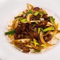 Ad7 Mongolian Dinner · Tender slices of beef stir-fried with green and white onion in a savory brown sauce and serv...