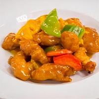 Ad4 Orange Chicken Dinner · Lightly battered chicken stir-fried with bell peppers. and carrots then drenched with a cara...