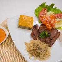 C3 Com Bi Cha Nem Nuong · A finely-groubd, seasoned pork patty is grilled then cut into strips to bring out the sweet ...