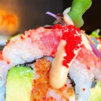 Florida Roll · Crab salad made with spicy mayo and tempura flakes, avocado, scallions and cream cheese. Wra...