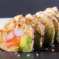 Soya Crunch Roll · Riceless. Salmon, kani, avocado, tempura flakes. Wrapped with soy paper and topped with spic...